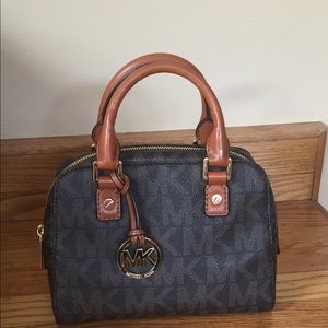 Michael Kors Jet set travel small satchel.